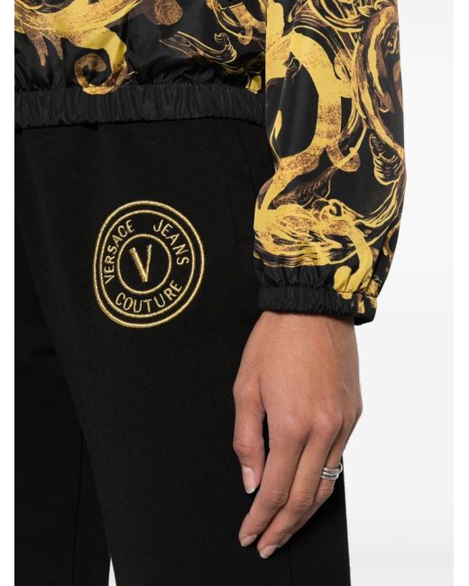 Pantalon de jogging en coton à logo brodé Versace en coloris Black