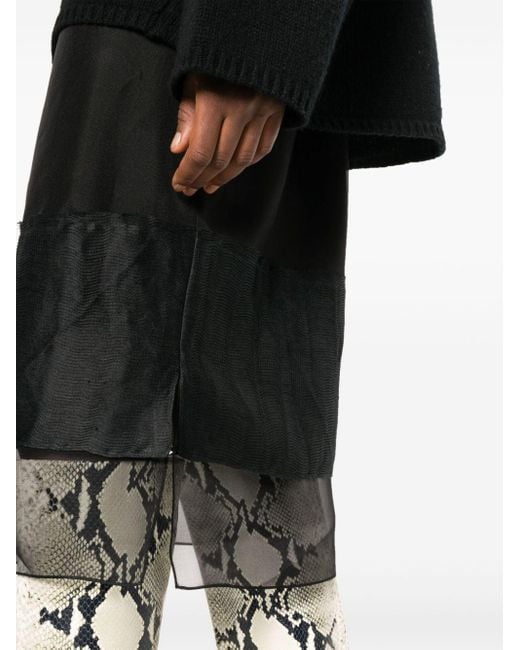 Jupe semi-transparente à design superposé Khaite en coloris Black