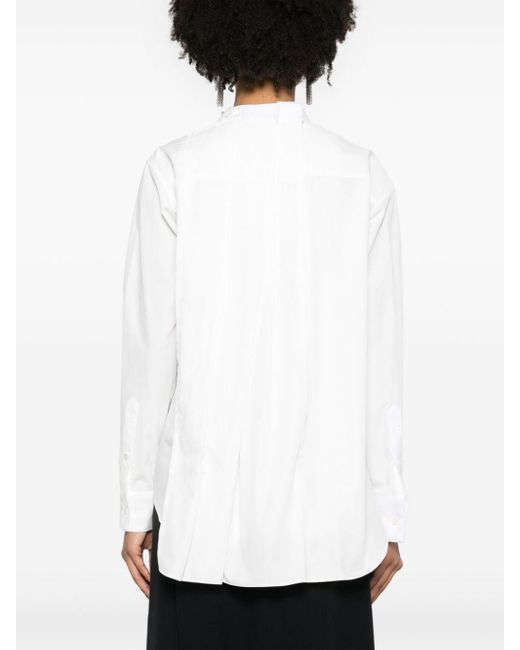 Asymmetric-neck pleated shirt di Sacai in White