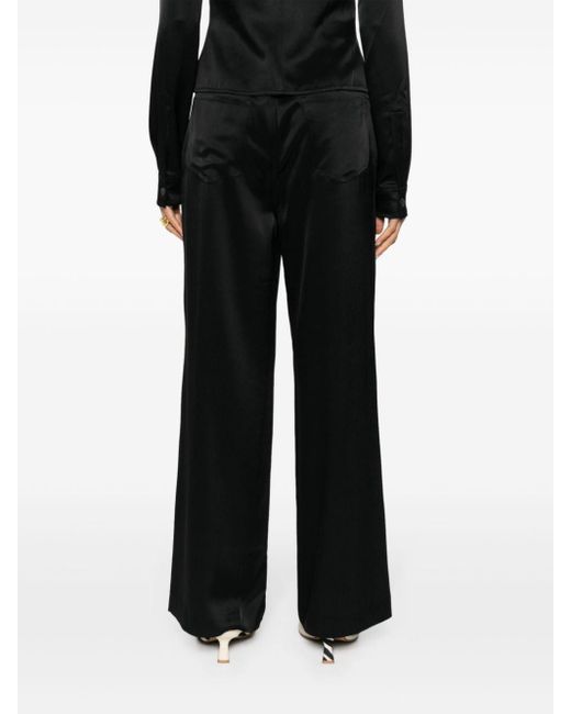 Pantalon Josine à coupe ample Nanushka en coloris Black