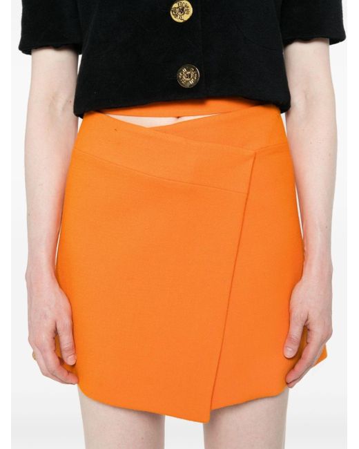 Minijupe à design portefeuille Patou en coloris Orange