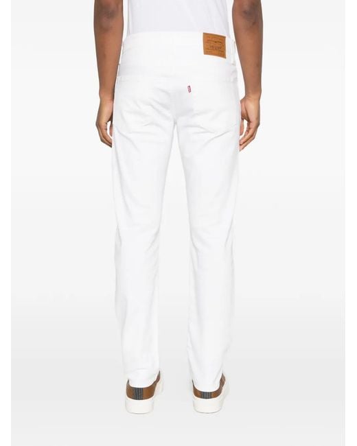 Levi's White 502 Buttoned Denim Jeans for men