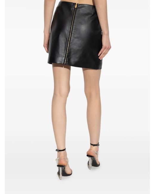 Leather Skirts Versace de color Black