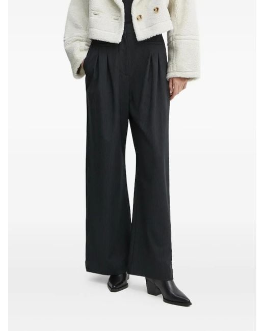 Munthe Black Pinstriped Pleated Trousers
