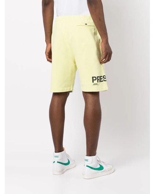 Heron Preston Yellow Logo-Print Track Shorts for men