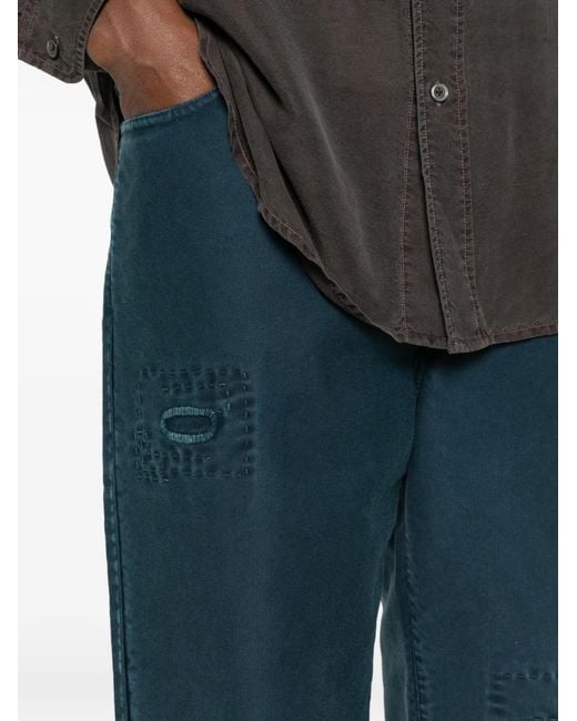 SEWMOD Blue Patch-Detail Garment-Dyed Jeans for men