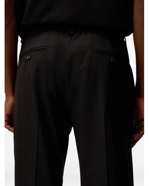 RETORI Black Pleated-Front Virgin-Wool Trousers for men