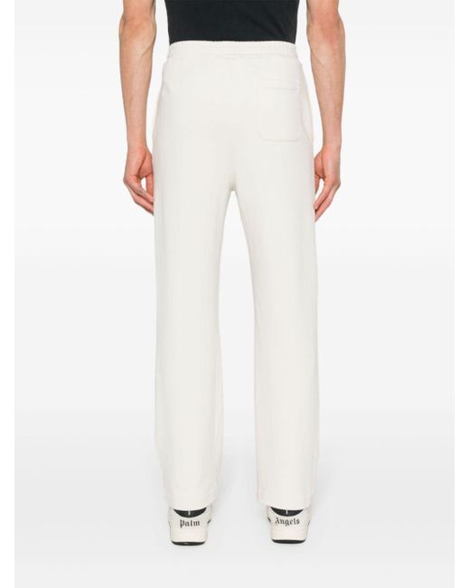 Pantaloni sportivi con ricamo di Palm Angels in White da Uomo