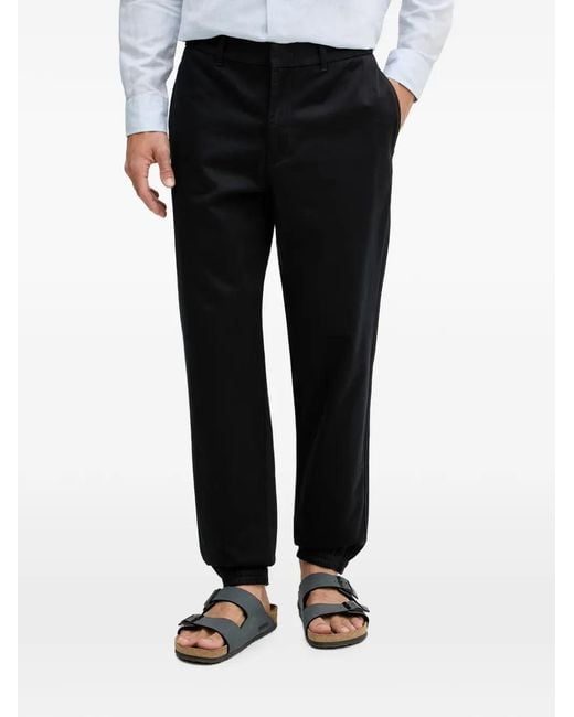 ARMANI EXCHANGE Black Monogram-Pattern Elasticated-Cuff Trousers for men