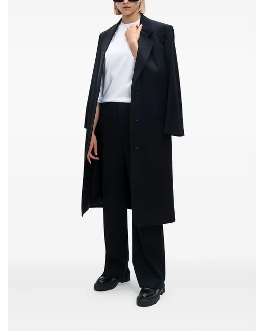 The Row Black Pleated Wide-Leg Trousers