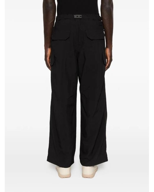 And Wander Black Zip Pocket Trousers for men