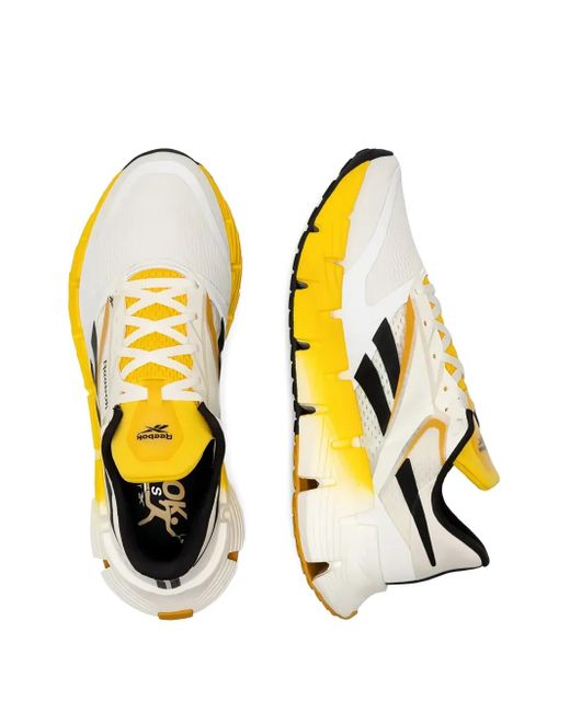 Baskets Floatzig Reebok pour homme en coloris Yellow