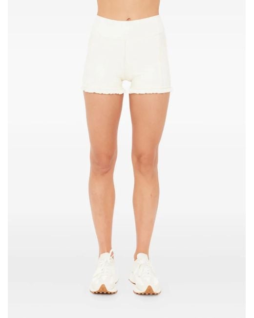 The Upside White Volant 3" Ruffled Spin Short