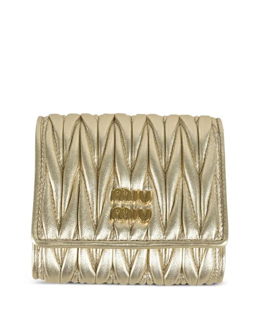 Portefeuille À Effet Matelassé Miu Miu en coloris Metallic