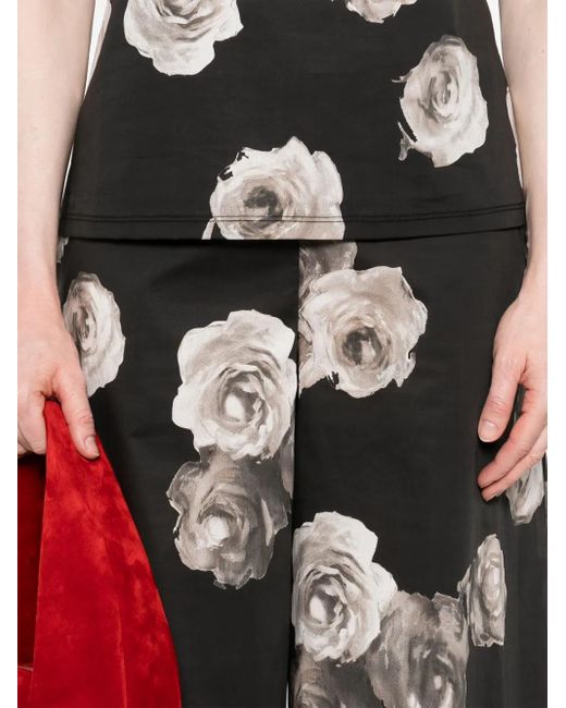 Pantalones anchos con estampado floral Liviana Conti de color Black