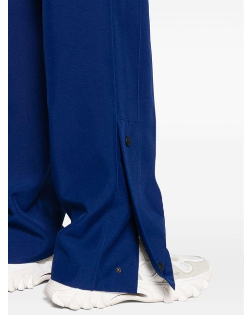 Versace Blue Logo-waistband Pleated Wide-leg Trousers for men