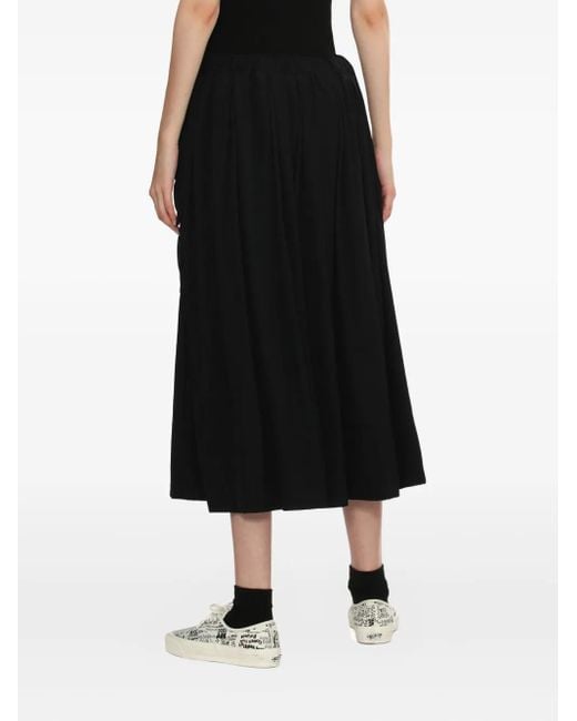 Falda midi con cinturilla elástica Comme des Garçons de color Black