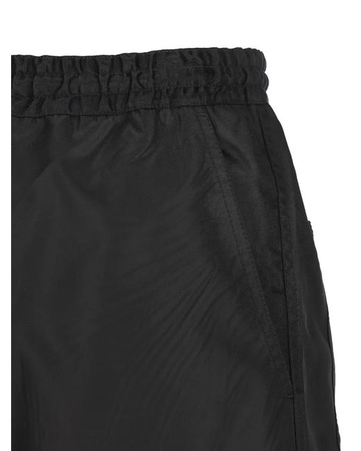 Prada Black Logo-Plaque Trousers for men