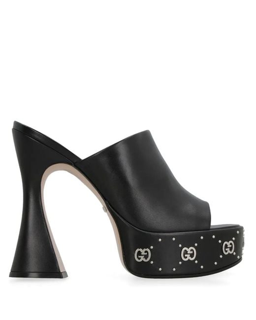 Gucci Black Leather Platform Sandals With Metallic Details And Curved Heels