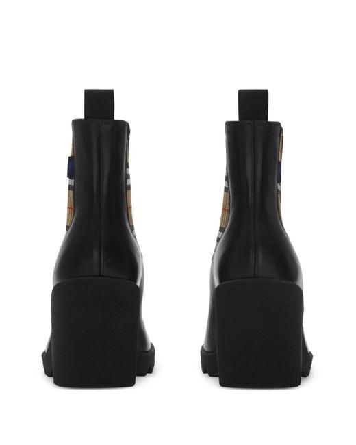 Botas chelsea con tacón de 85 mm Burberry de color Black