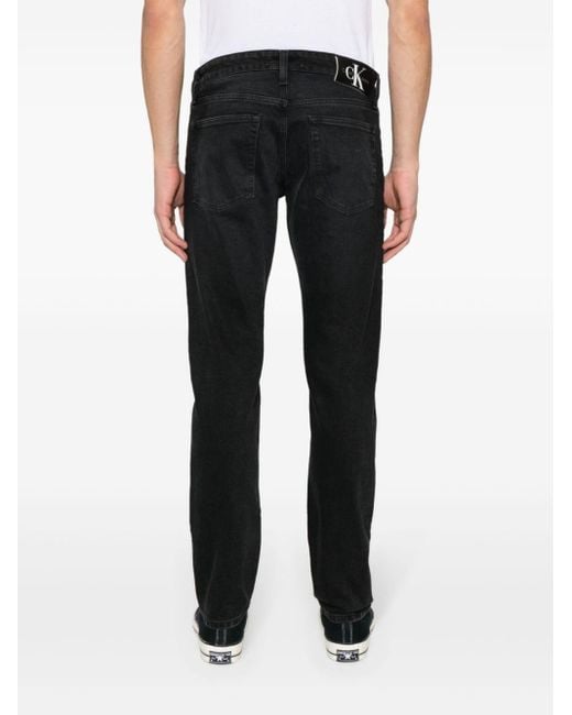 Jean slim à taille basse Calvin Klein pour homme en coloris Black