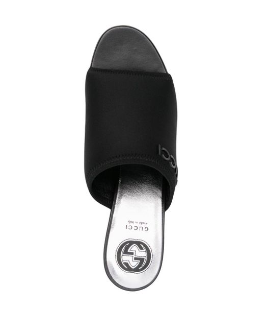 Mules Interlocking G con tacón de 75 mm Gucci de color Black