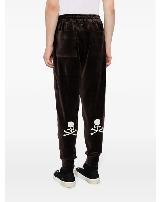 MASTERMIND WORLD Black Tapered Velour Track Pants for men