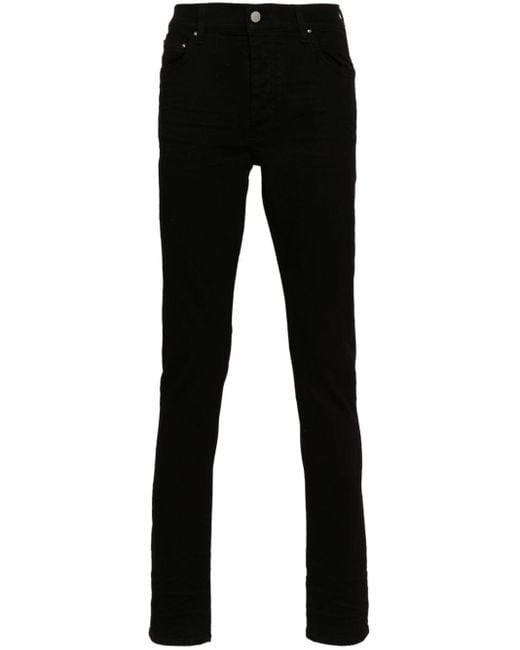 Jeans skinny Stack di Amiri in Black da Uomo