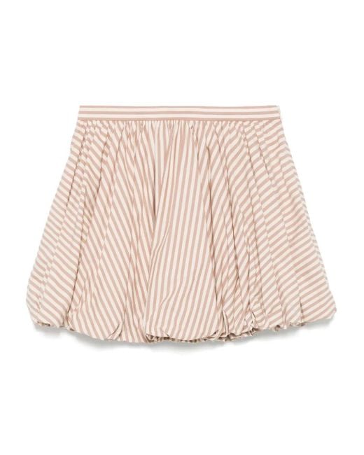 Falda corta con pliegues Sandro de color Natural