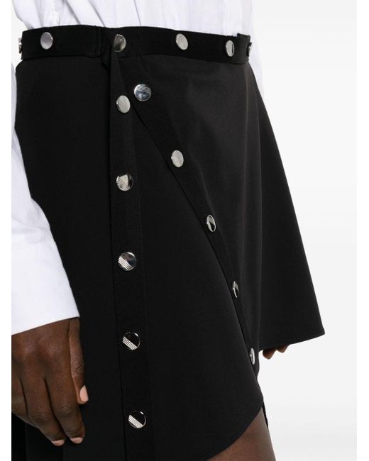 Minifalda asimétrica con cierres de presión The Attico de color Black