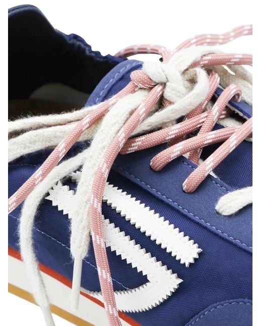PURAAI Blue Panther Logo-Patch Panelled Sneakers for men