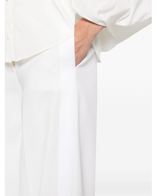 Pantalones palazzo con rayas laterales Stella McCartney de color White
