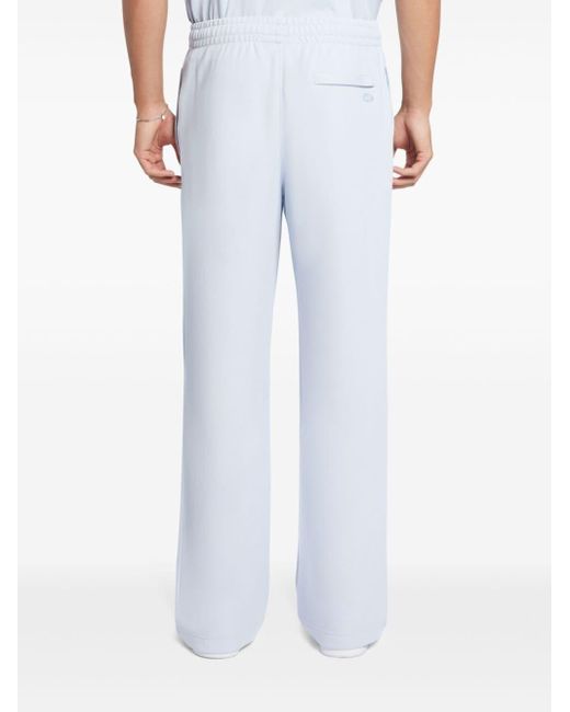 Pantalones de chándal con costuras en relieve Lacoste de hombre de color White