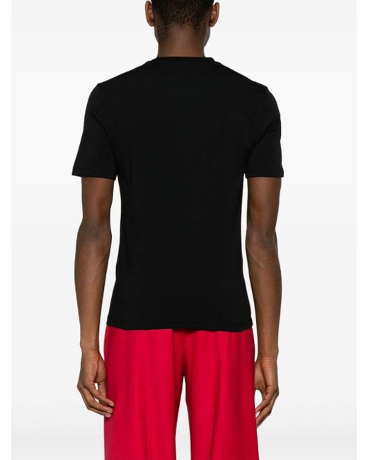 Camiseta con parche de goma Moschino de hombre de color Black