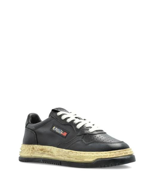 Autry Black Leather Distressed-Sole Sneakers