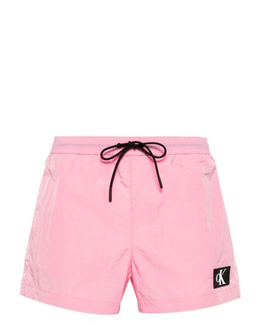 Short de bain à patch logo Calvin Klein pour homme en coloris Pink