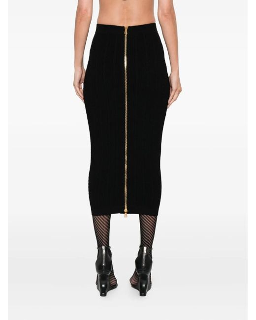 Falda midi de punto de ochos con botón Balmain de color Black