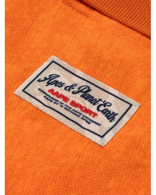Aape By A Bathing Ape Orange Buttoned Logo-Patch Polo Shirt for men