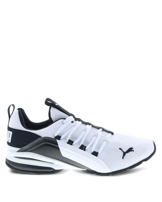 Sneakers Axelion Break di PUMA in White da Uomo