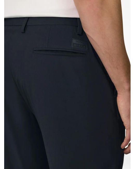 Pantalones Elásticos Boggi de hombre de color Blue