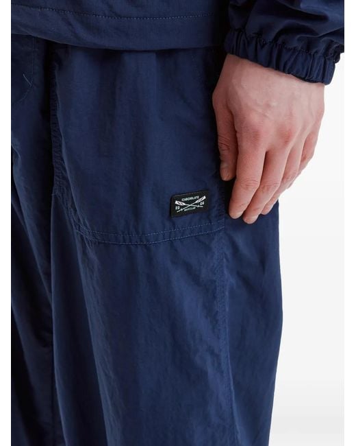 Chocoolate Blue Logo-Patch Trousers for men