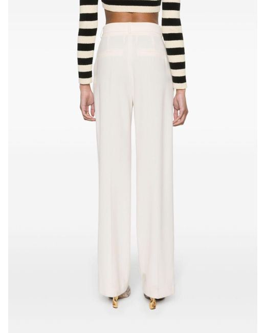Pantalon ample Lanai à taille-haute Nanushka en coloris White
