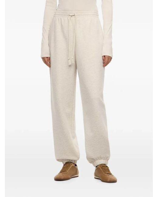 12 STOREEZ White Central Park Track Pants