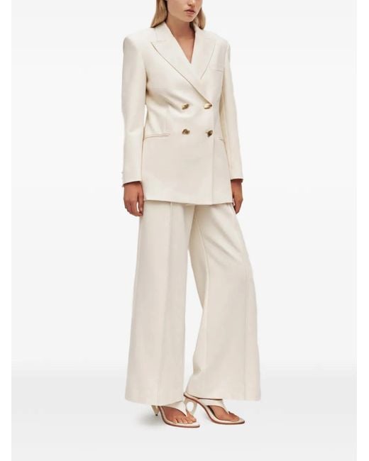 Aje. Natural Vortex Pressed-Crease Trousers
