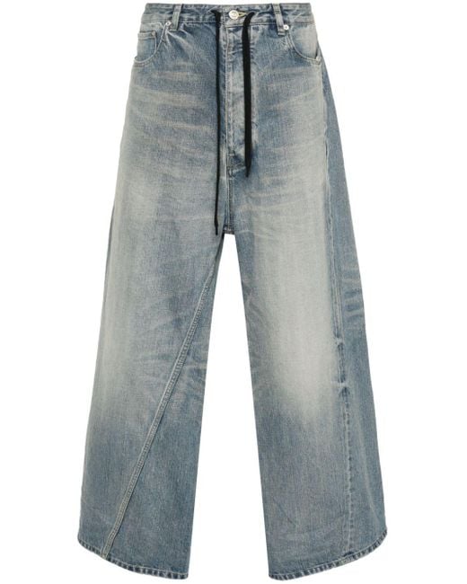 Balenciaga Gedraaide Jeans Met Wijde Pijpen in het Blue