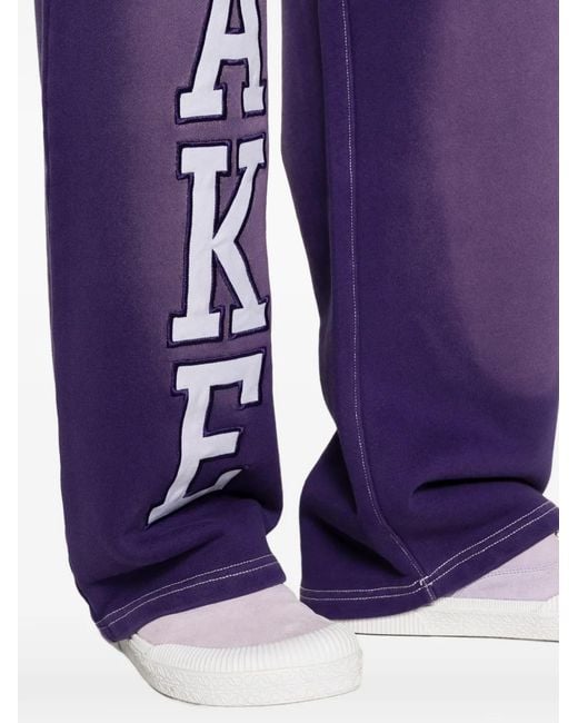 AWAKE NY Purple Letter-Embroidered Trousers for men