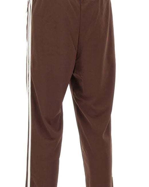 Pantalones de chándal con rayas laterales Adidas de hombre de color Brown