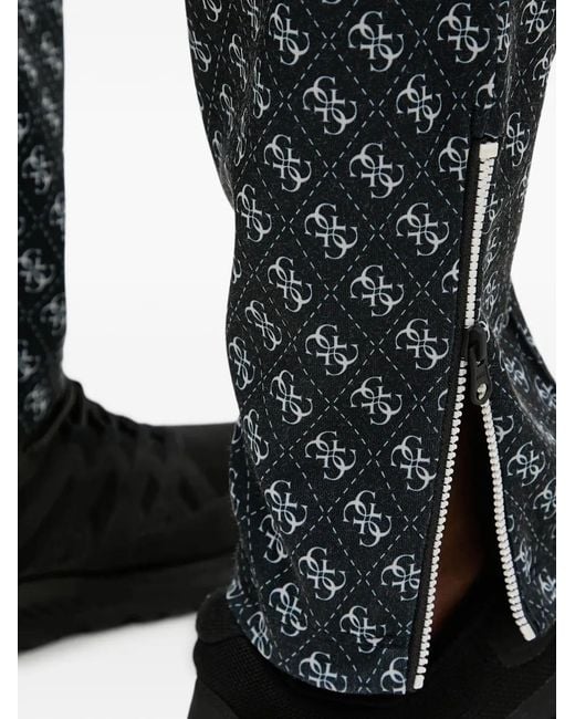 Guess Black Logo-Print Trousers for men