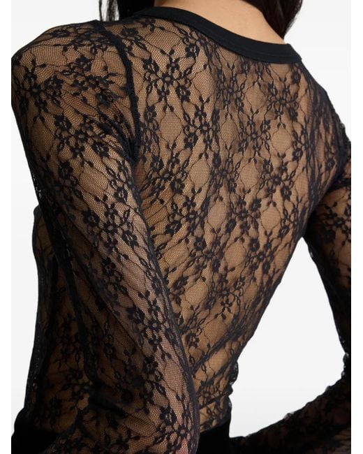 Top con encaje floral Patou de color Black
