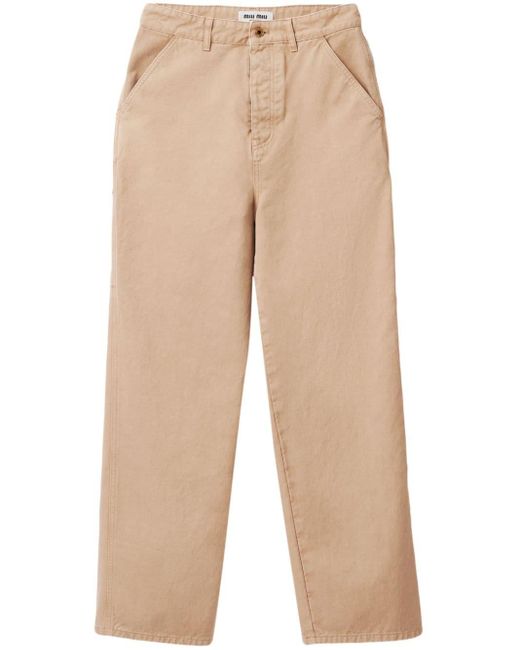Pantalones con aplique del logo Miu Miu de color Natural